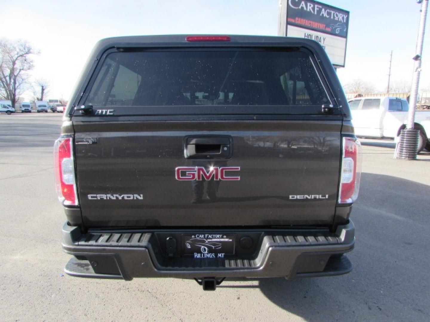 2019 Smokey Quartz Metallic /Gray Leather GMC Canyon Denali Crew Cab 4WD Long Box (1GTG6EEN6K1) with an 3.6L V6 DOHC 24V engine, 8A transmission, located at 4562 State Avenue, Billings, MT, 59101, (406) 896-9833, 45.769516, -108.526772 - Photo#2